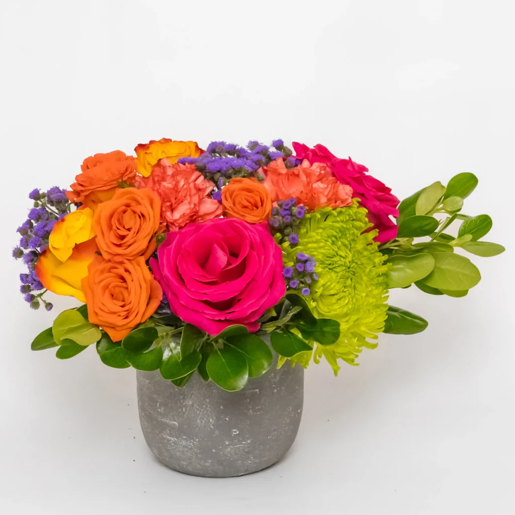 Aurora Luxee floral arrangement with pink and orange roses, green chrysanthemums and seasonal flowers in a modern gray vase. Elegant birthday flower gift, thinking of you bouquet, and same-day flower delivery in Los Angeles. Perfect for celebrations, special occasions, or sending a thoughtful surprise just because.